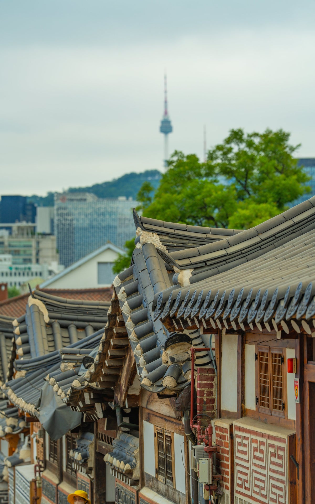 Traditional hanok rooftops in Bukchon Hanok Village with N Seoul Tower, Seoul