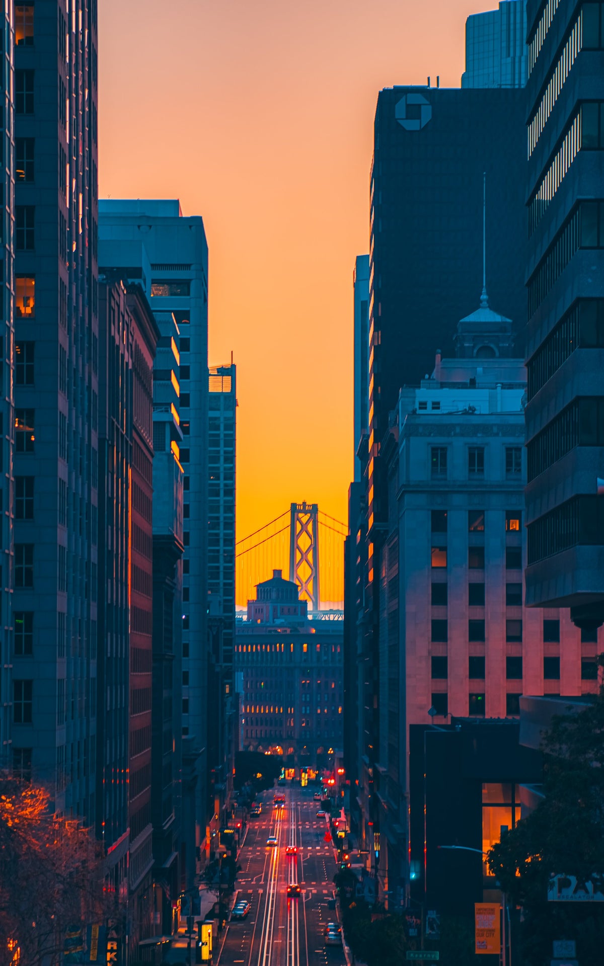 California Street skyscrapers leading to the Bay Bridge at sunrise, San Francisco
