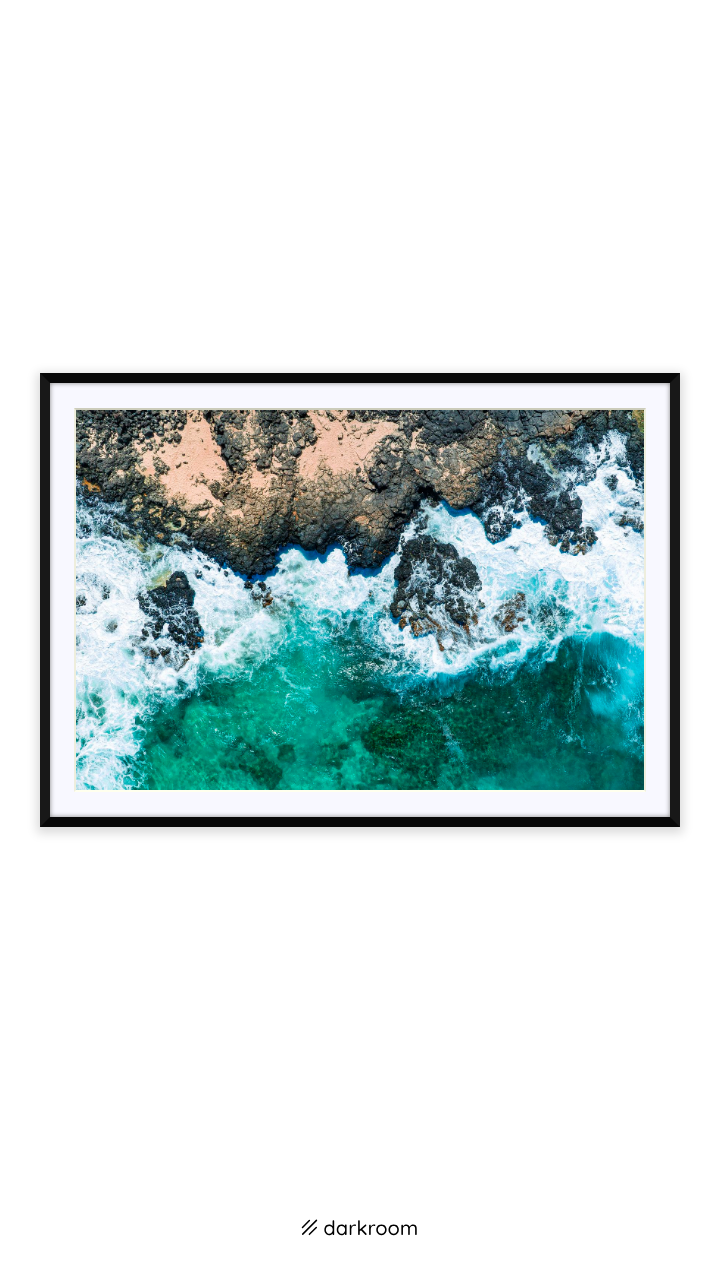 Black-framed print: Aerial photo of foam and lava rock on the Oahu coast, Hawaii