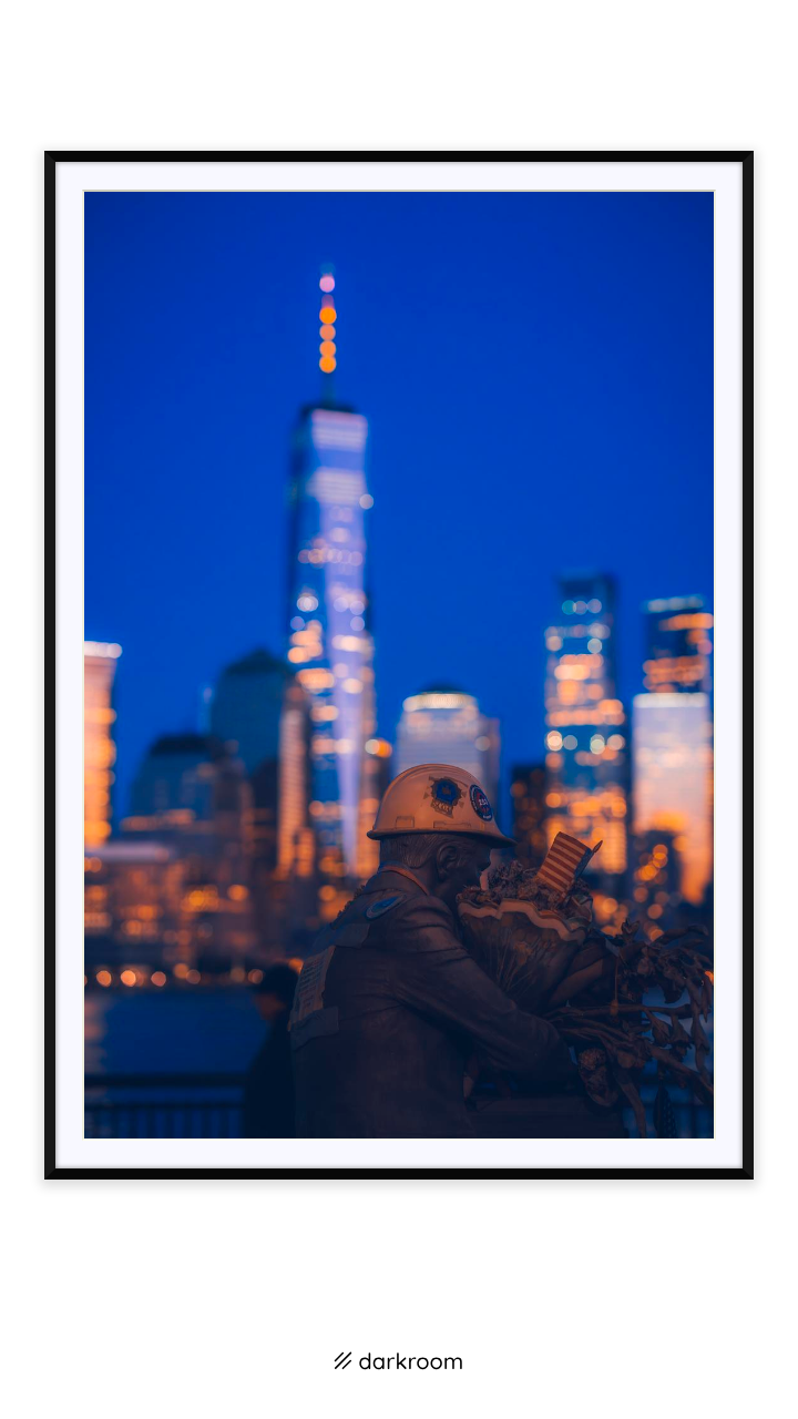 Black-framed print: One World Trade Center rising through blue hour haze in New York City